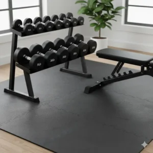 A clean and compact home workout area featuring a versatile rubber coated dumbbells set.