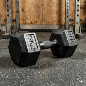 A classic solid cast iron 125 lb dumbbell designed for intense strength training.