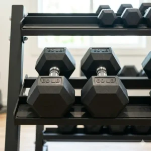 High-quality rubber-coated 60 lb dumbbells for sale designed to protect gym flooring from impact.